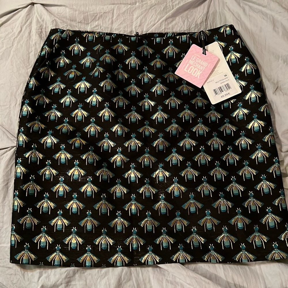 8/$20 naff Naf skirt metallic bug mini size 36 Size 8 pockets and super cute NWT